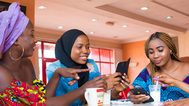 friends, cellphone, and fast food