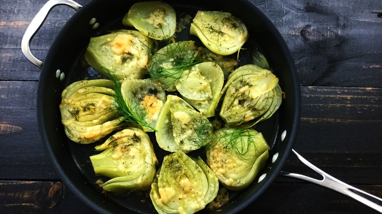 fennel bulbs braised in a pan