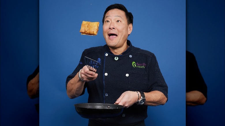 Ming Tsai flipping bing in pan