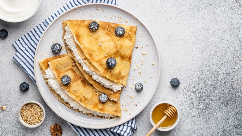 Crepes with fresh ricotta and blueberries