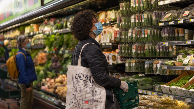 person shopping for produce