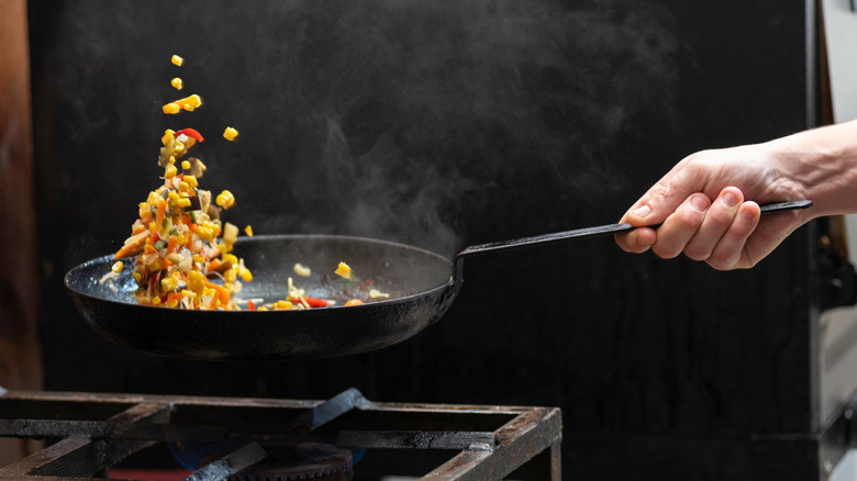 Cooking vegetables on stove