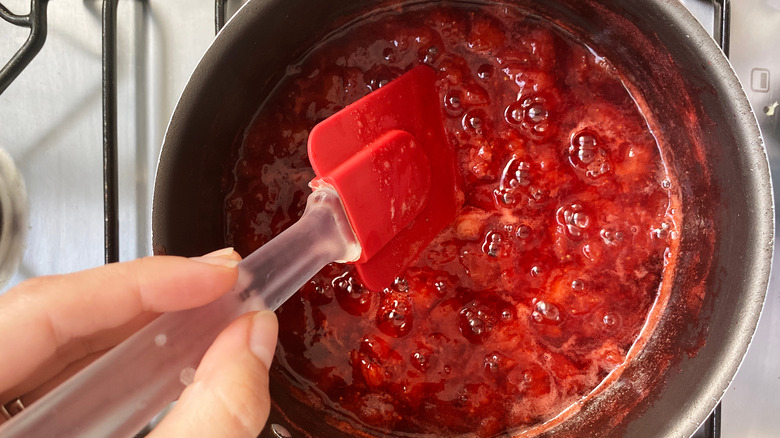 strawberry syrup in a saucepan