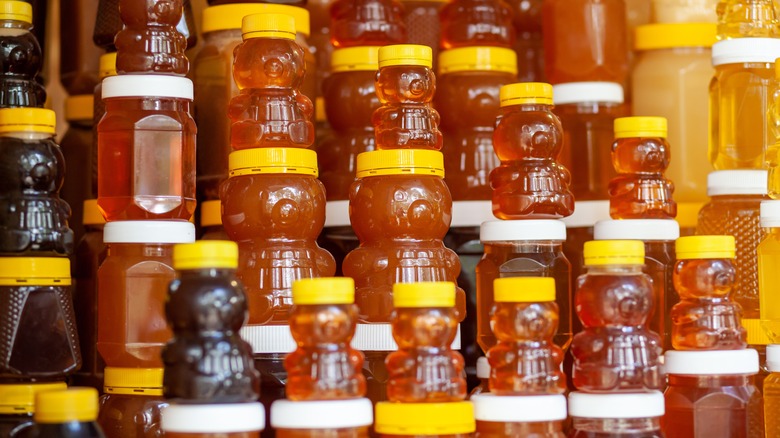 Honey containers on shelf