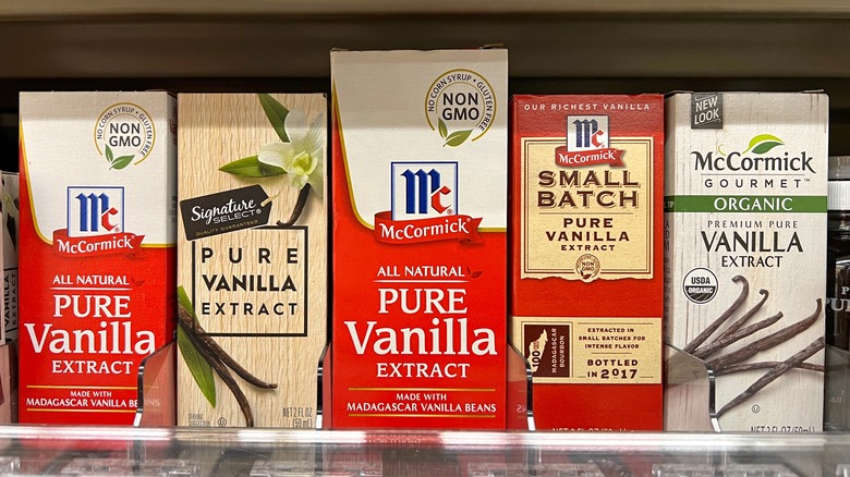 Boxes of pure vanilla extract on a shelf