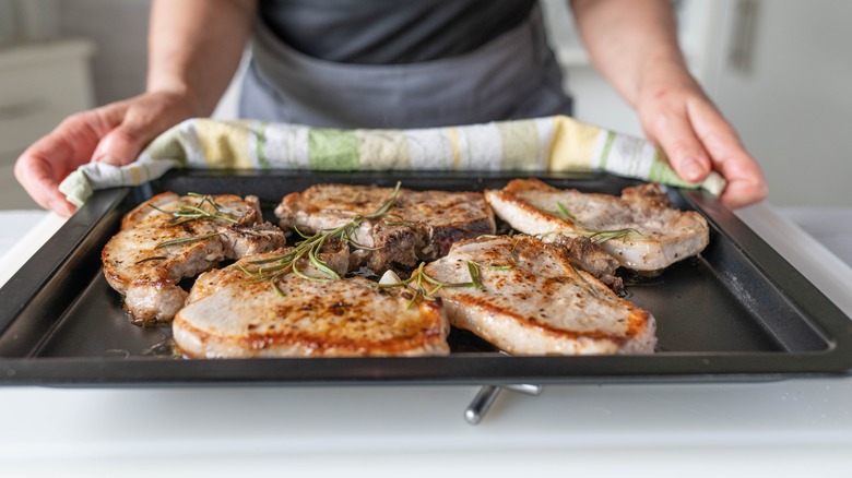 baked pork chops on tray