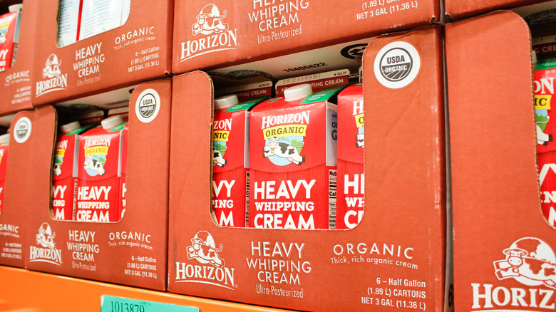 cartons of heavy cream on shelf