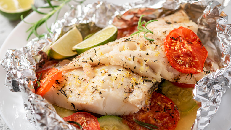 Cod in foil with tomato and lime