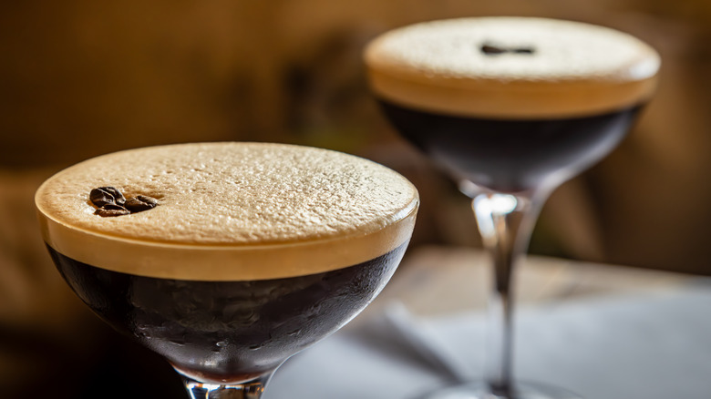 2 espresso martinis garnished with espresso beans