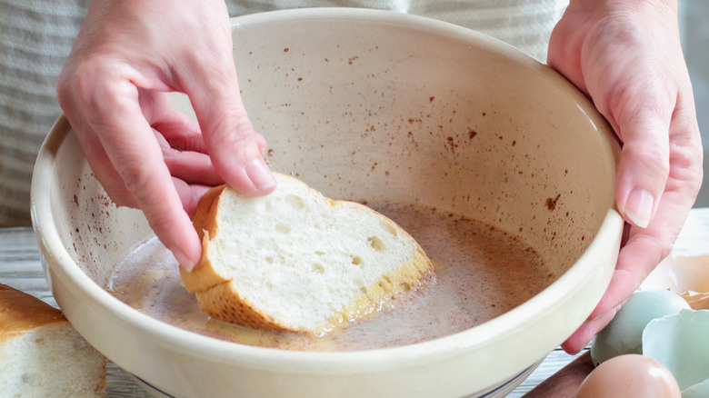 woman slice bread egg dip