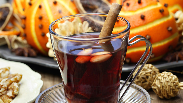 Glass of Glögg with blanched almonds and cinnamon