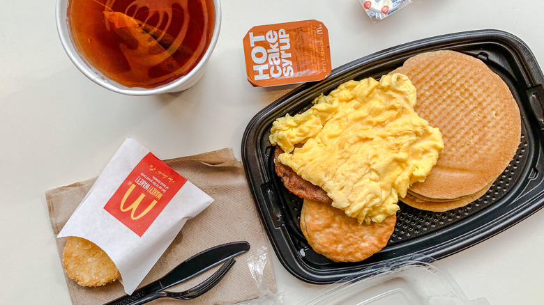 McDonald's breakfast with pancakes, eggs, and a hashbrown