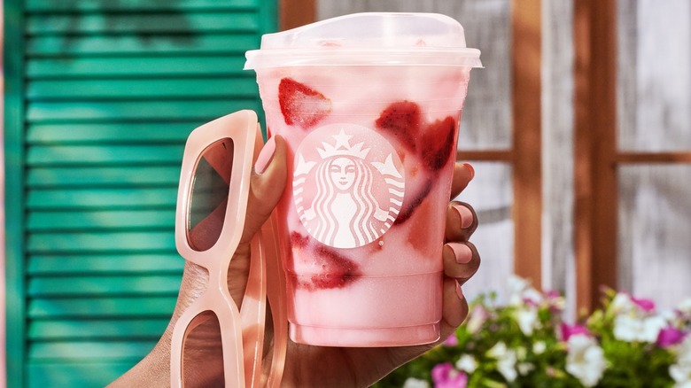 Starbucks pink drink in hand