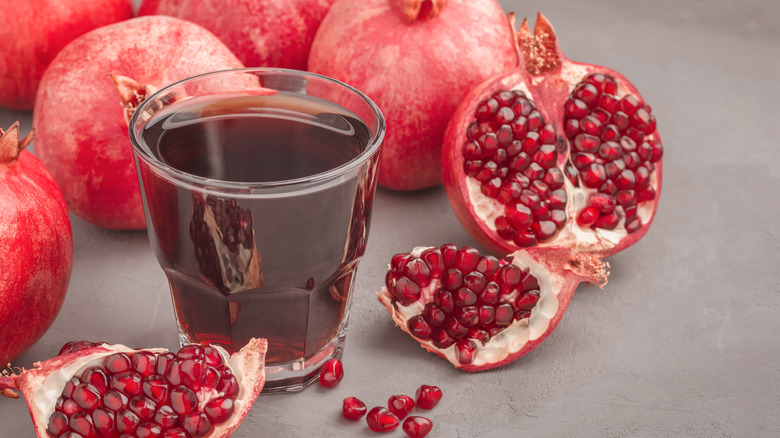 Pomegranates and glass of juice