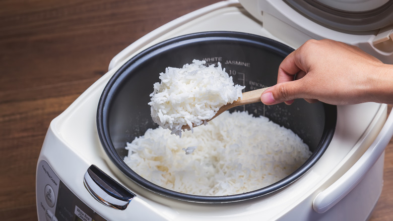 Rice being cooked in a rice cooker