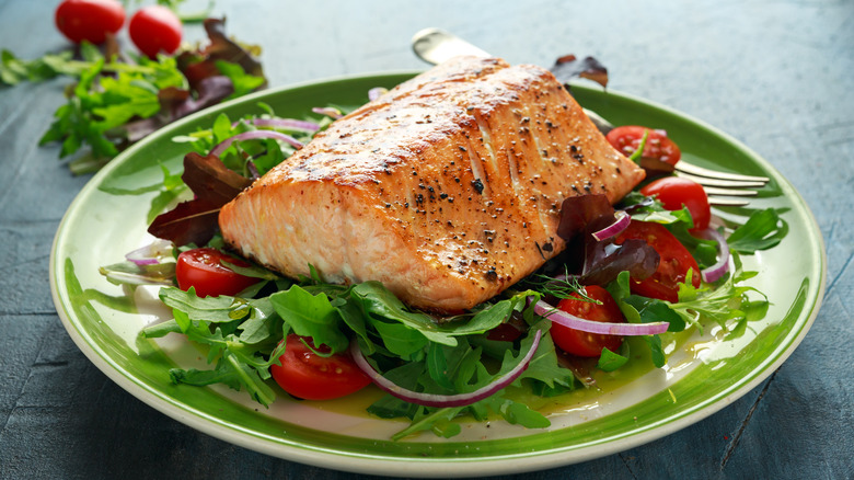 baked salmon on salad