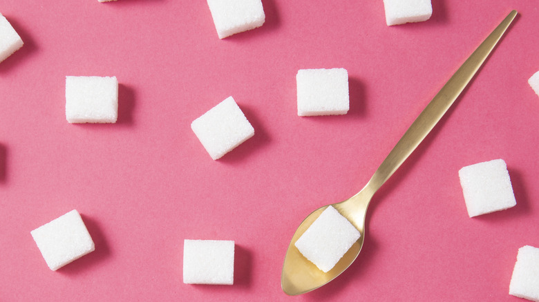 Sugar cubes and spoon