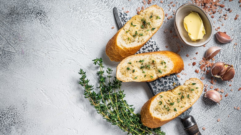 Garlic bread on gray background