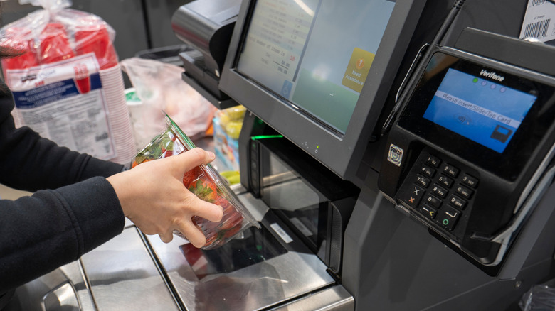 Scanning strawberries at Costco checkout