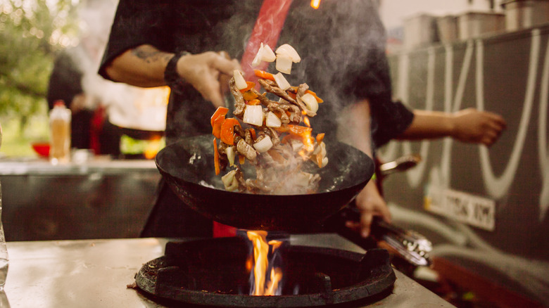 Cooking with a wok