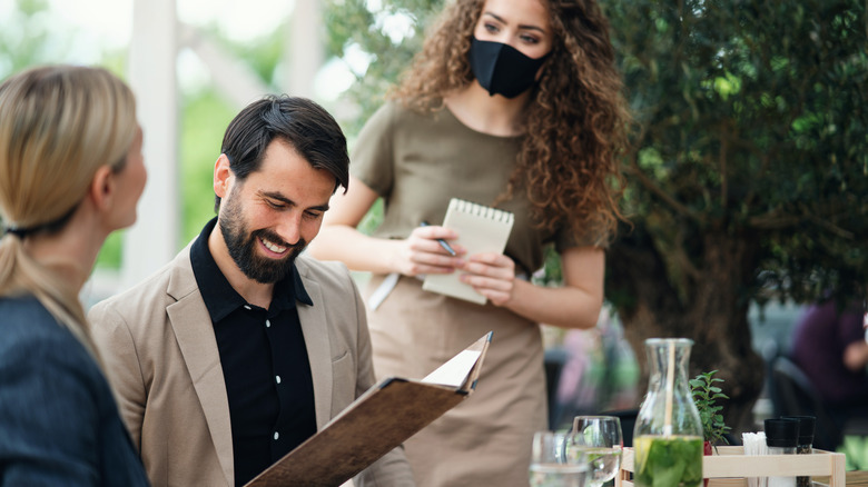 waitress taking order at restaurant