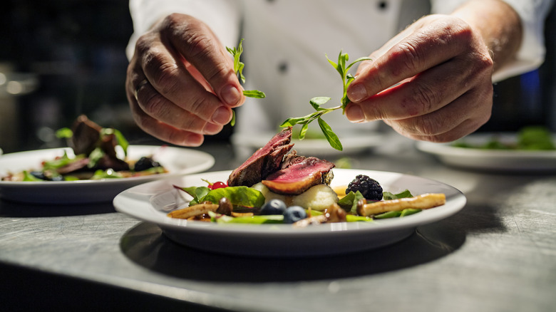 chef preparing restaurant dish