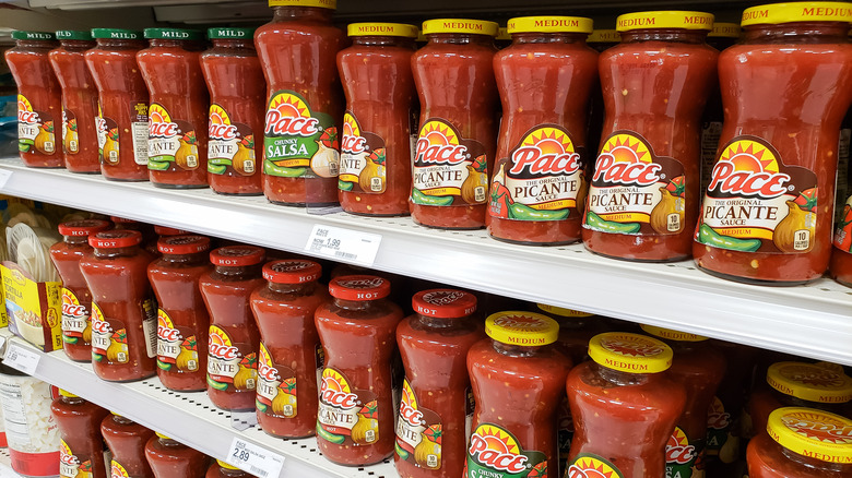 Jars of salsa at store