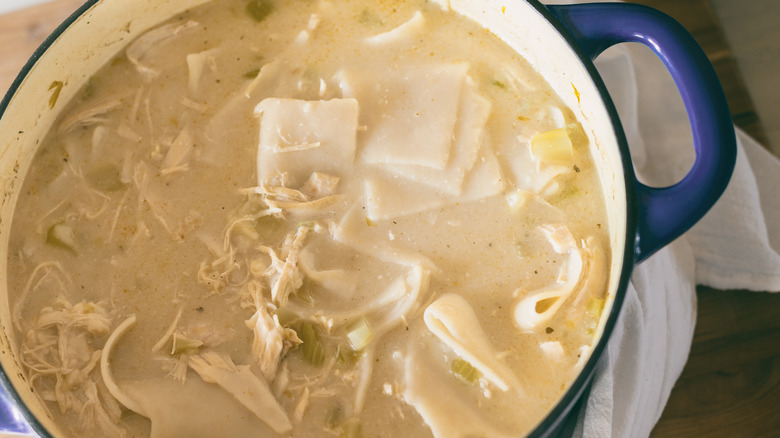 slippery dumplings in a blue crockpot