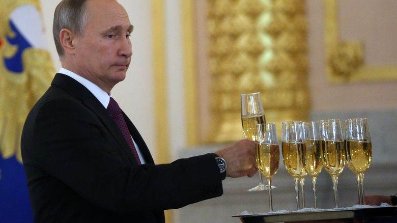 Vladimir Putin with Russian Champagne