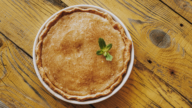 sugar cream pie on wood background