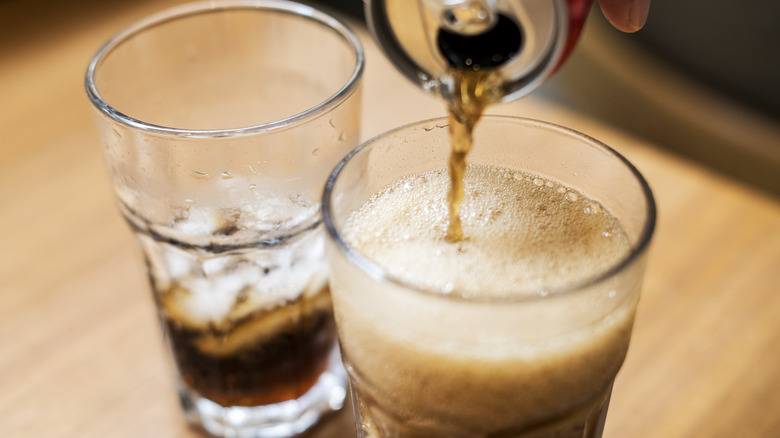 Pouring soda into a glass 