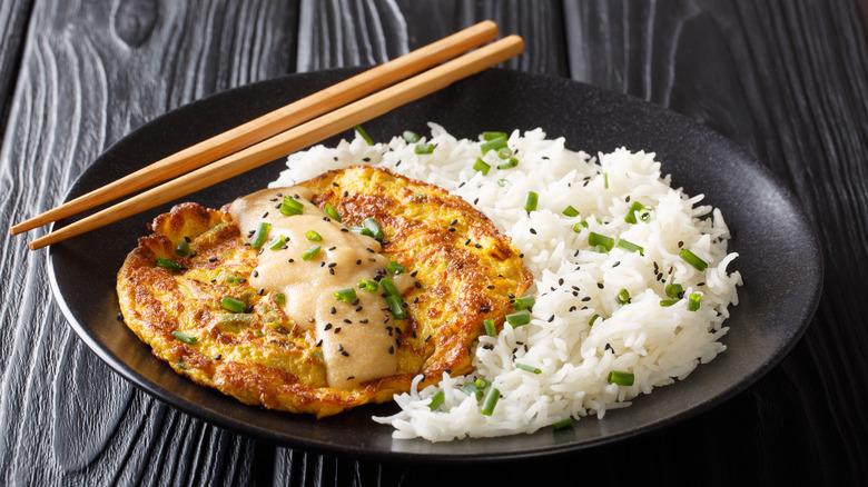 Egg foo young with chopsticks