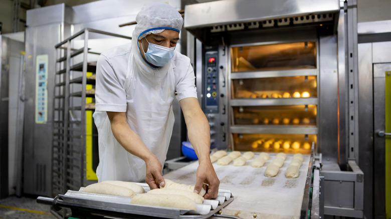worker at industrial bakery