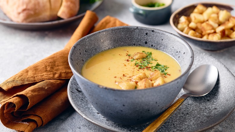 Soup with potatoes, parsley, and chili flakes