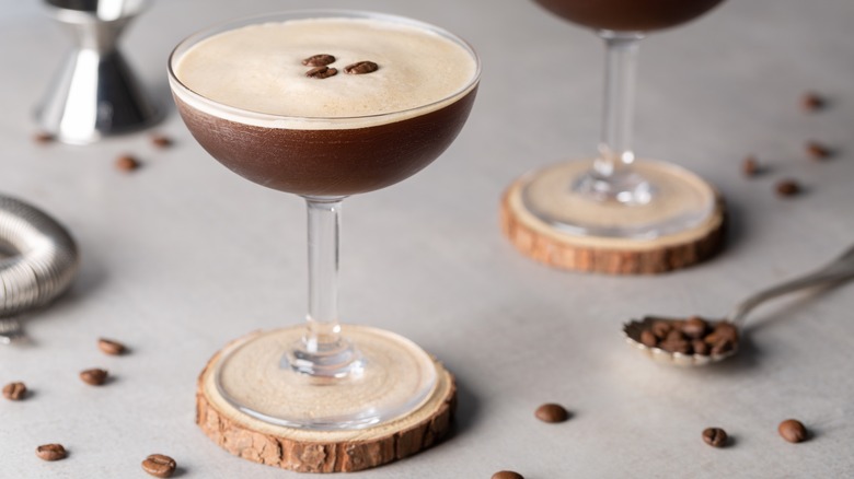 Espresso martini on wooden coaster