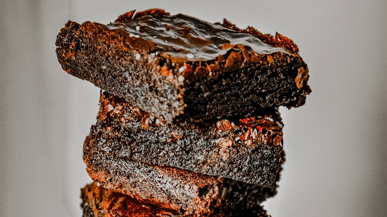 Close-up of homemade fudgy brownies with soy sauce