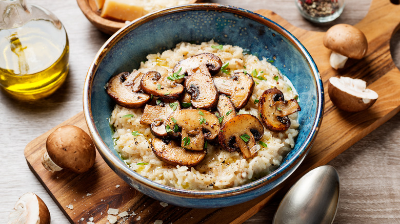 Risotto topped with mushrooms