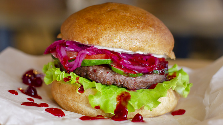 burger with pickled onions