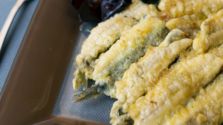 plate of battered and fried sardines