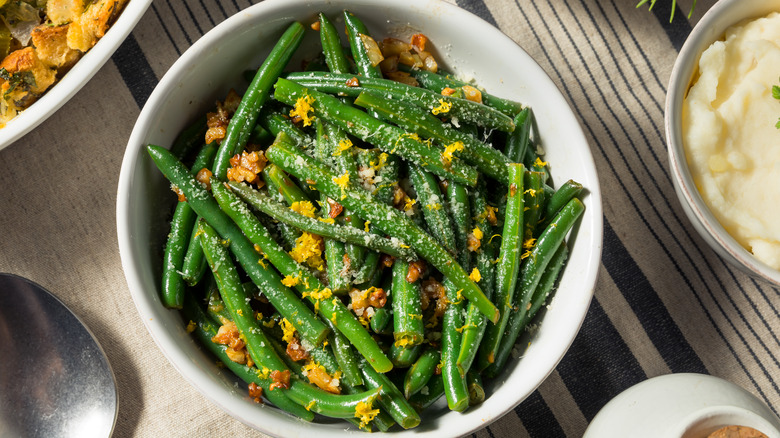 Bowl of green beans on table