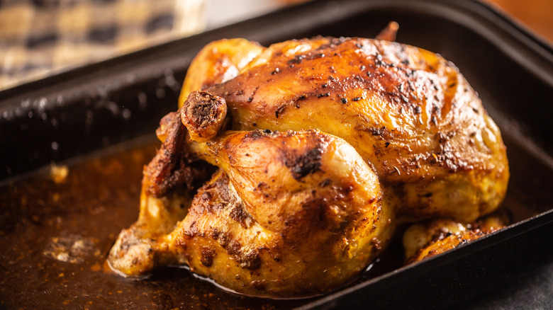 brined chicken in a roasting pan