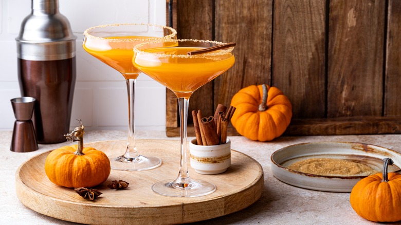 Two pumpkin martinis with pumpkins