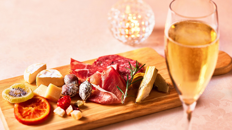 sparkling wine and cheese board