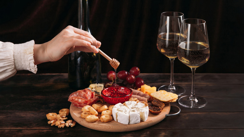 sparkling wine with cheese board