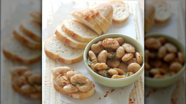 marinated butter beans and sliced bread