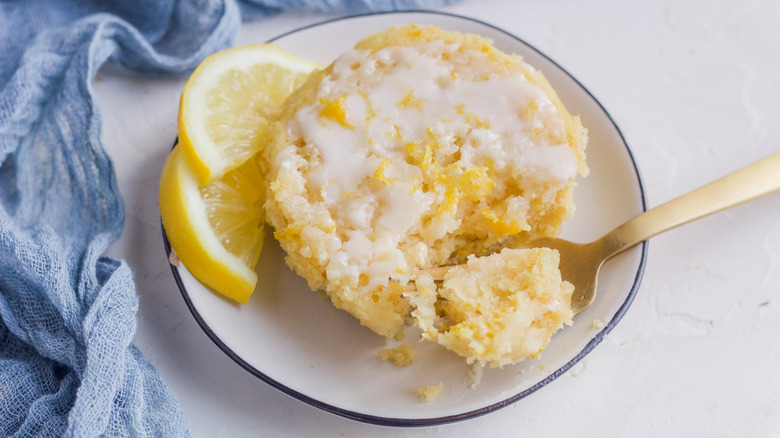 Mug cake on plate with fork