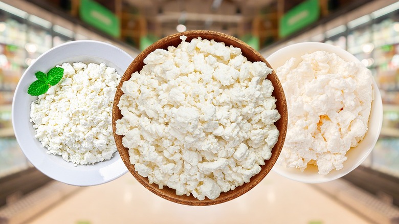 three bowls of cottage cheese with blurred supermarket background