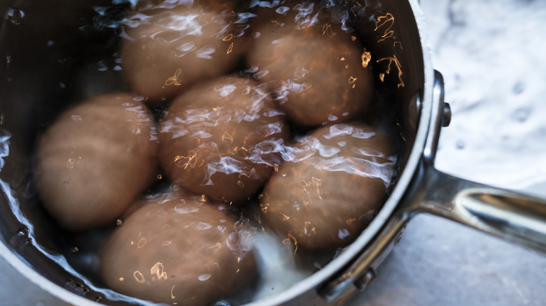 eggs boiling in pot