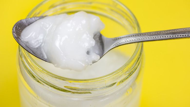 Coconut oil with spoon