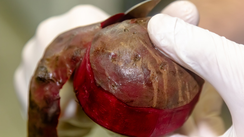 peeling beets with gloves